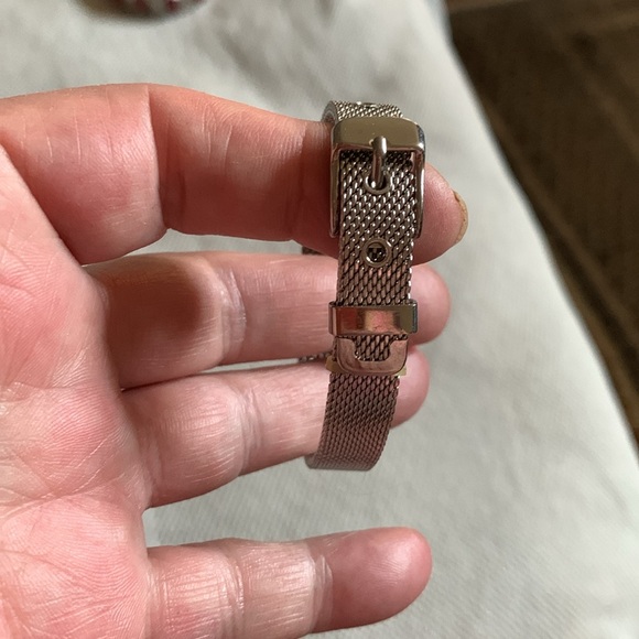 4 Bracelets Silver one can hold charms. Pinkish colored one from Holts. - Picture 5 of 6